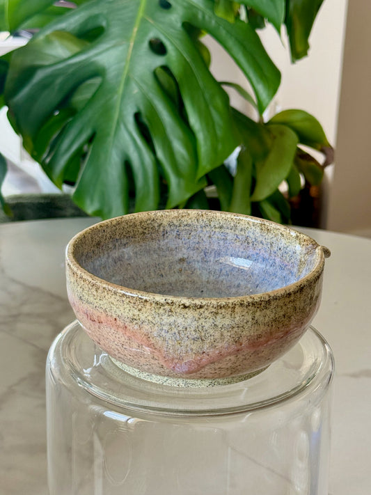 Glazed spouted bowl top view showing blue-lavender to pink gradient interior