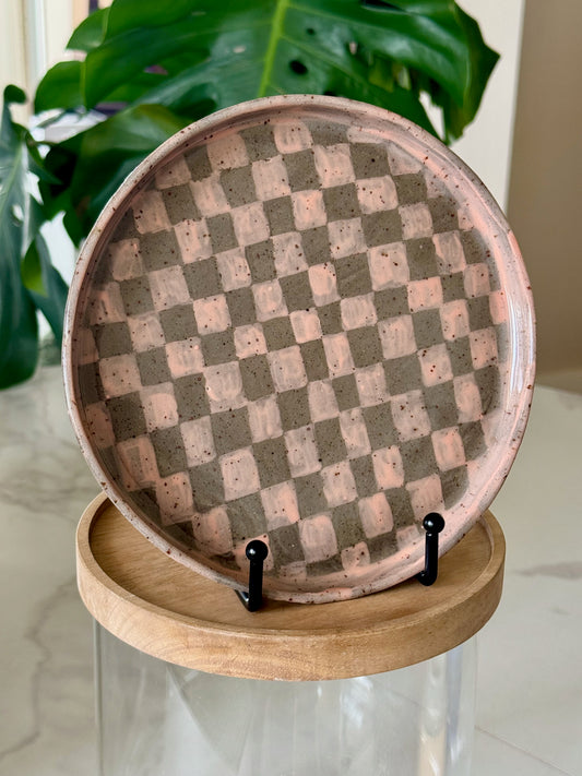Checkered plate with hand-painted pink and taupe checker pattern