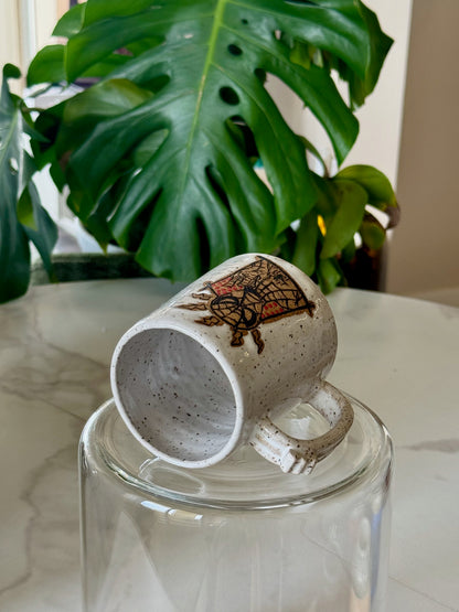 Spider-Man mug side view showing speckled glaze and illustration wrap