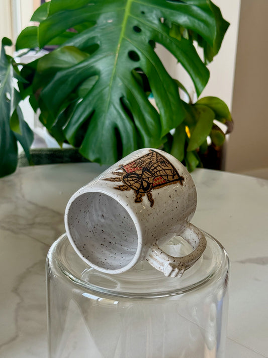 Spider-Man mug side view showing speckled glaze and illustration wrap