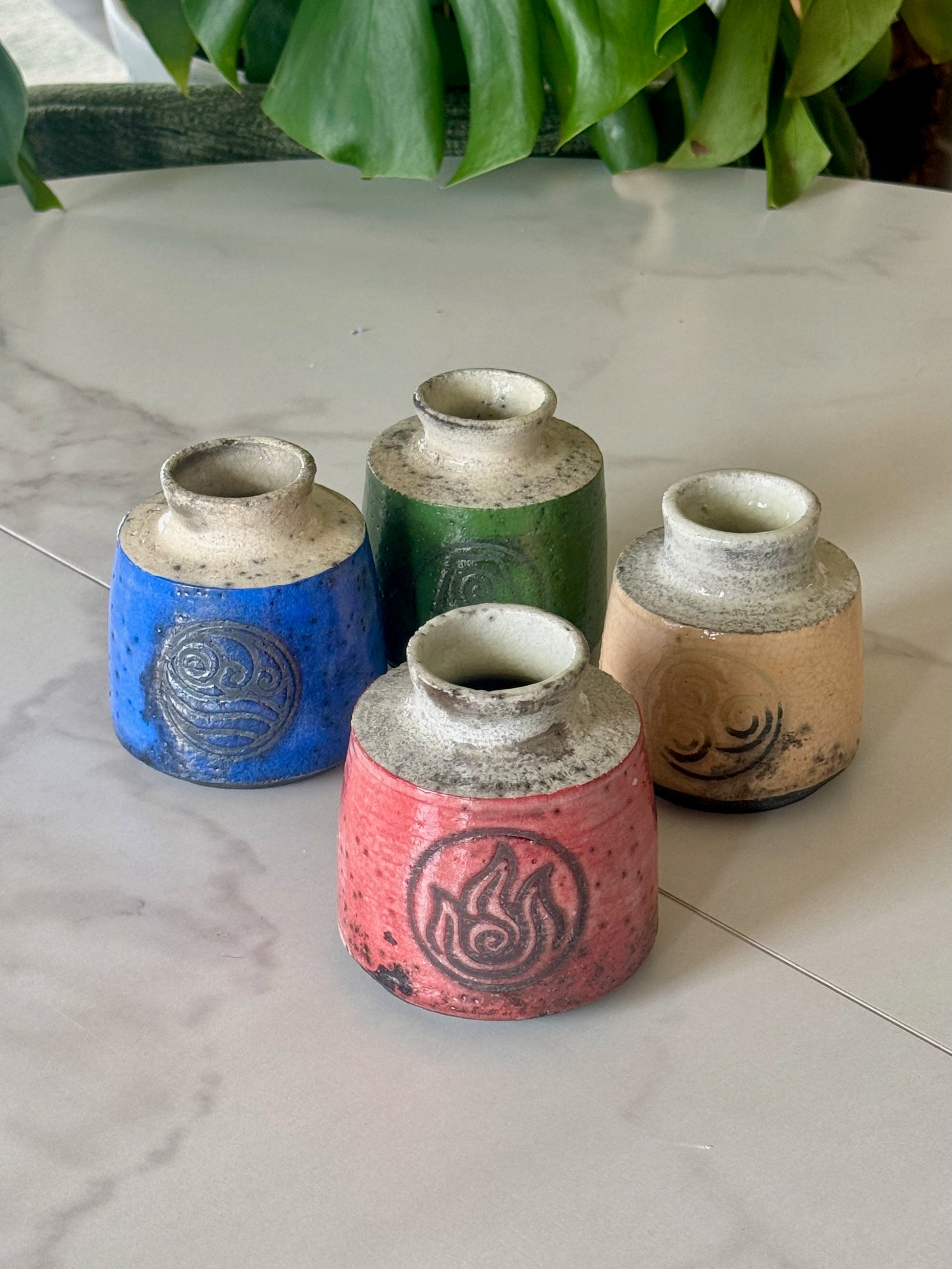 Earth Kingdom raku bud vase in forest green with earth symbol stamp
