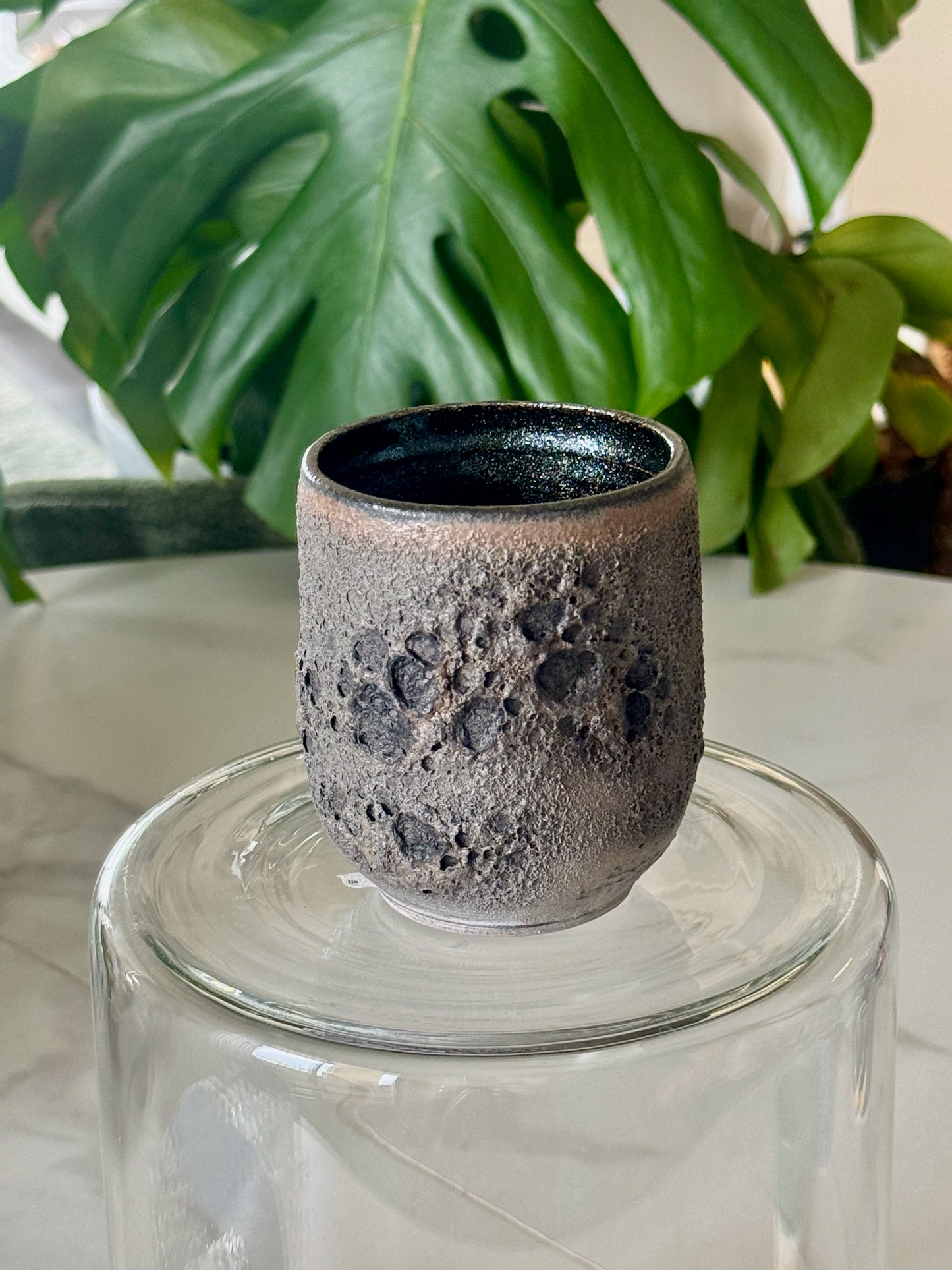 Matte cream sage thumb cup with lavender speckled base