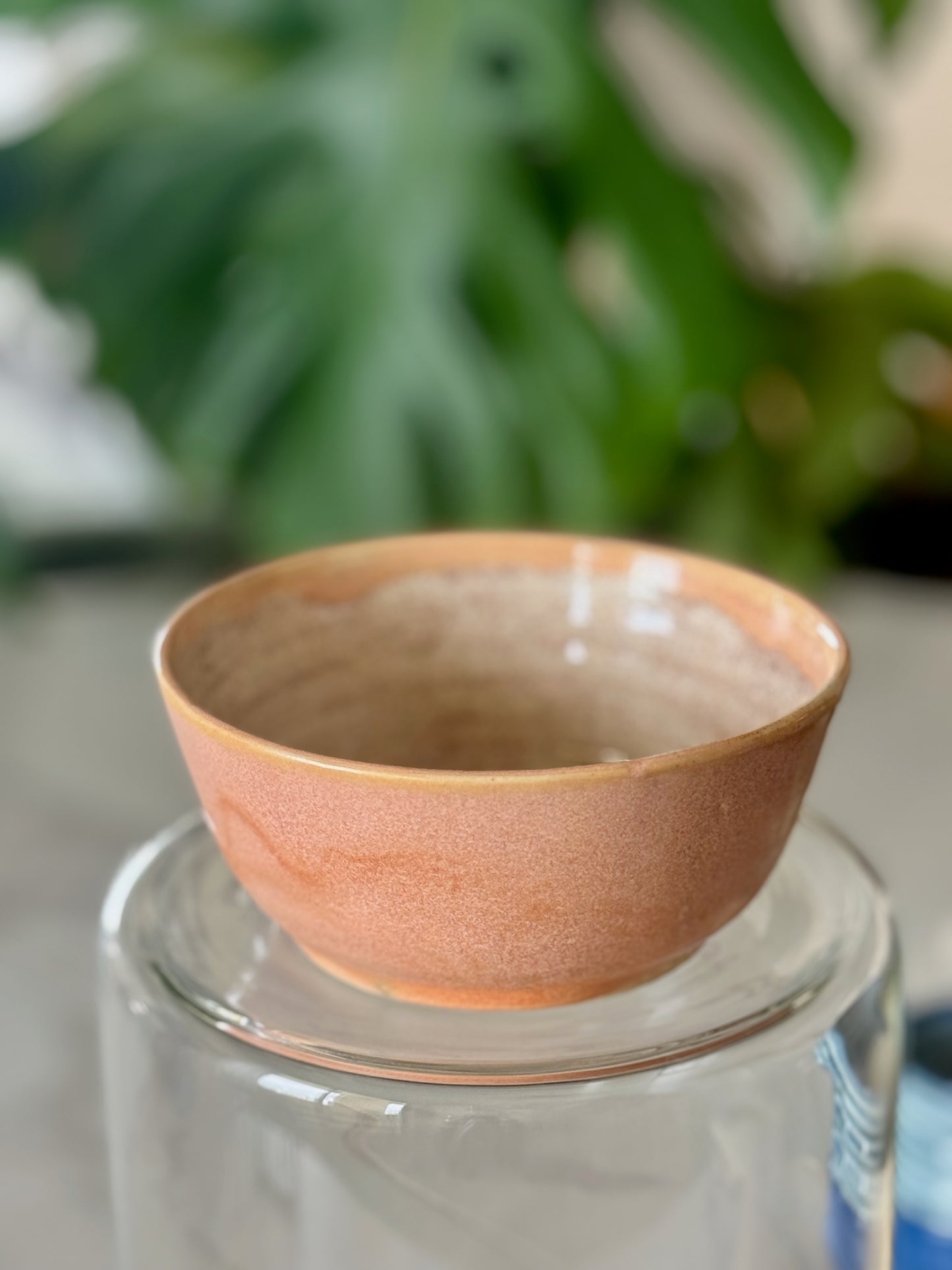 Spiral glaze bowl front view showing warm peach glaze exterior