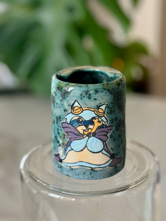 D&D raccoon adventurer cup side view showing full character illustration